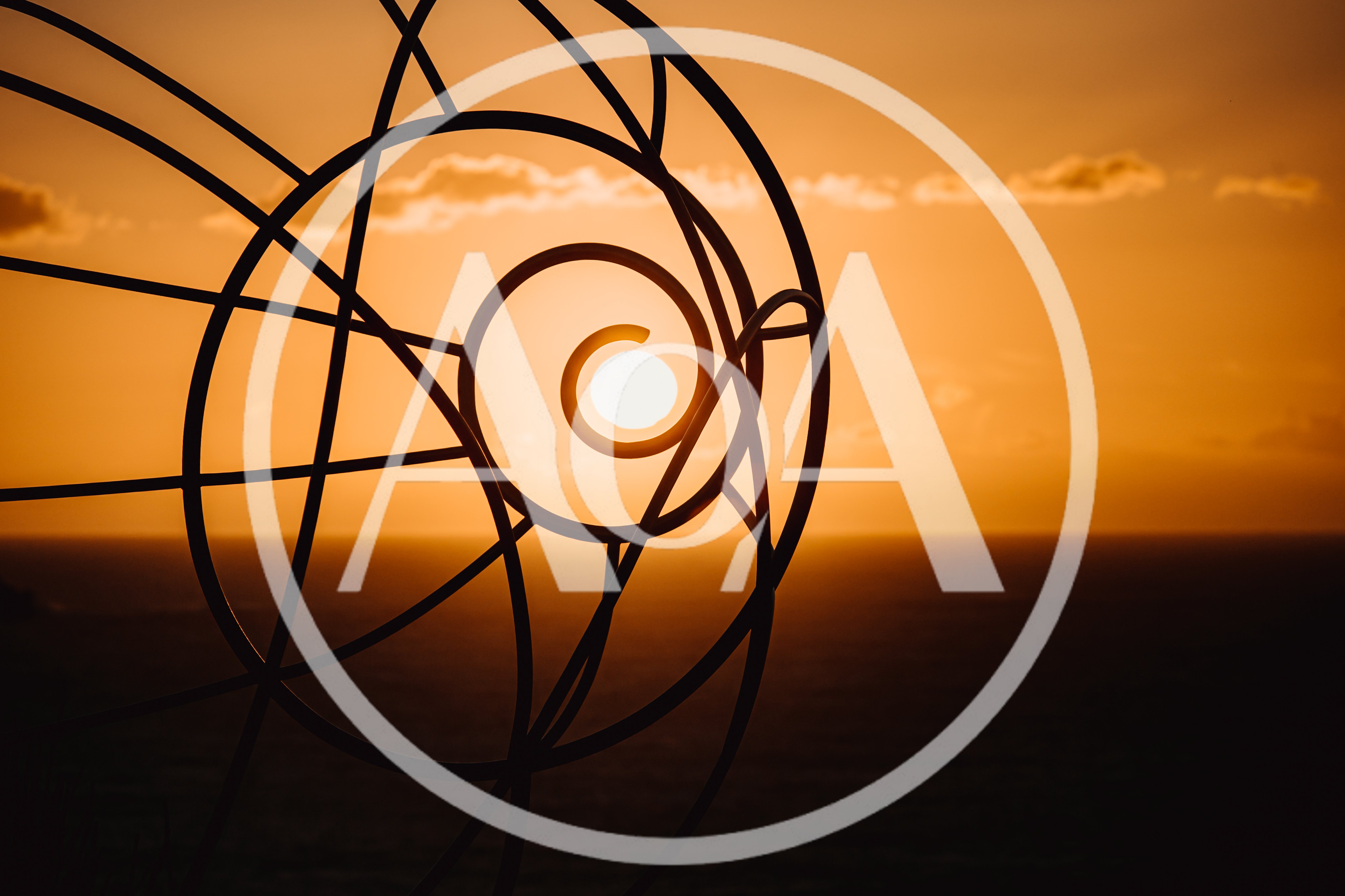 Sunset Viewed Through A Metal Spiral Sculpture