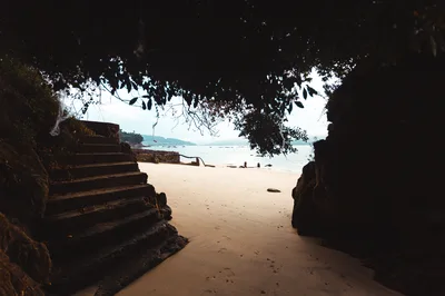 Stone Stairs Leading To A Secluded Sandy Beach