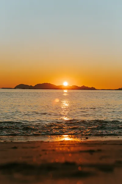 Golden Sunset Over The Ocean Horizon