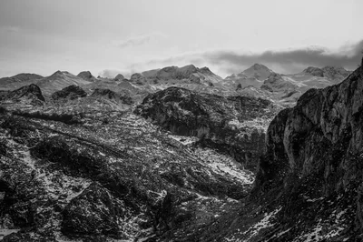 Rugged Mountain Range With Snow Covered Peaks