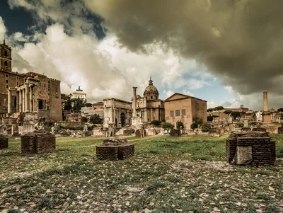 Ancient Roman Forum Ruins Under Dramatic Cloudy Sky