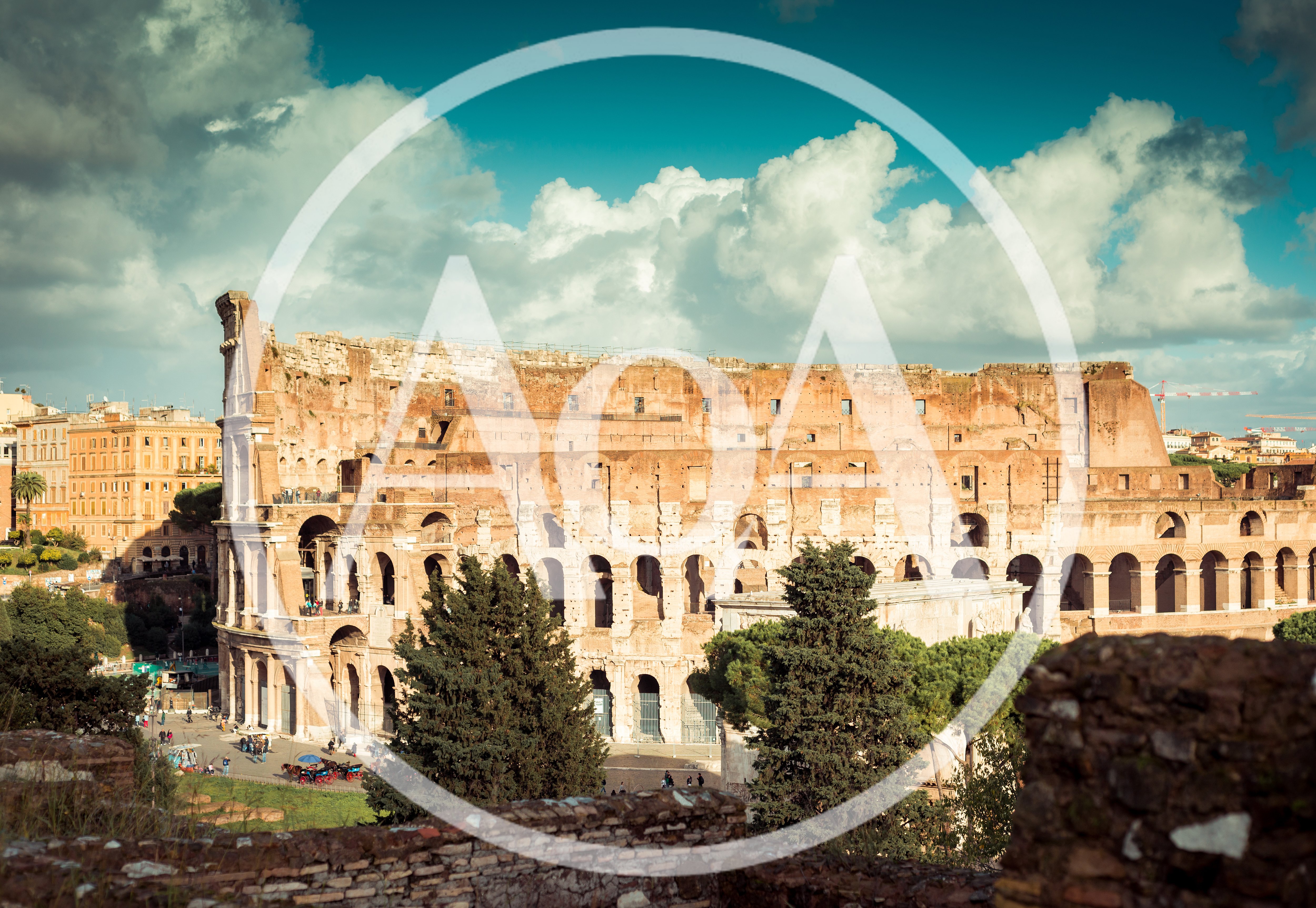 The Colosseum Amphitheater Under A Dramatic Cloudy Sky