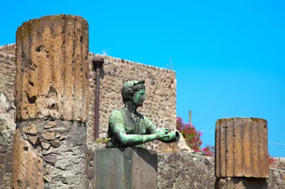 Bronze Statue Of A Woman In Pompeii Ruins