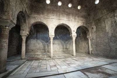 Ancient Moorish Bathhouse Interior With Stone Arches