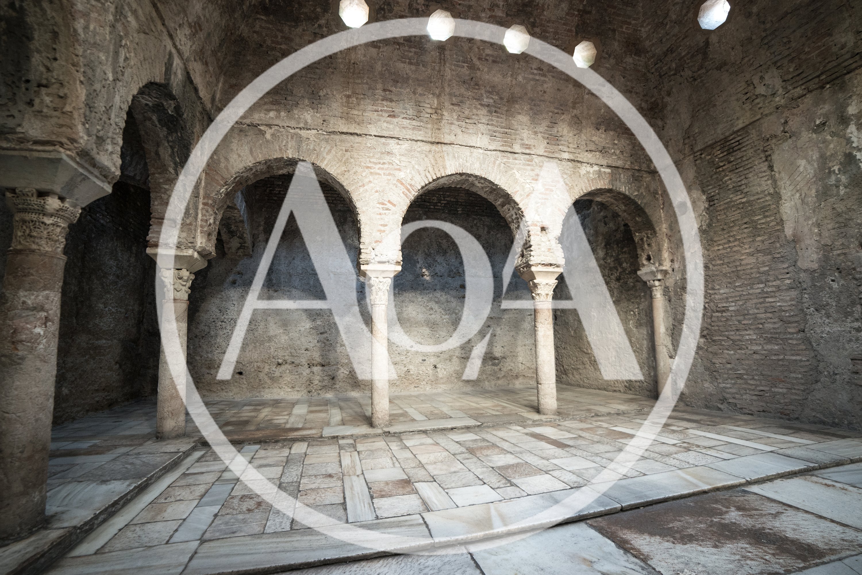 Ancient Moorish Bathhouse Interior With Stone Arches