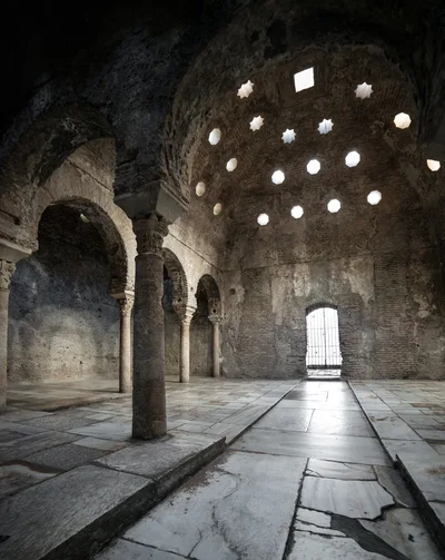 Interior View Of The Historic Moorish Baths In Granada