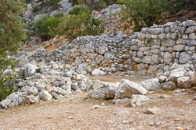 Ancient Stone Ruins In A Mediterranean Landscape