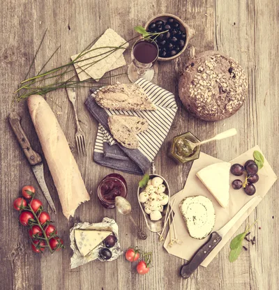 Rustic Charcuterie Board with Assorted Cheeses and Bread