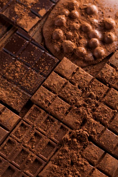Dark Chocolate Bars Covered In Cocoa Powder