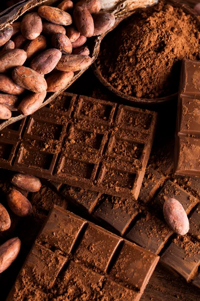 Cocoa Beans and Chocolate Bars with Cocoa Powder