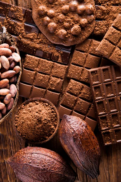 Assorted Chocolate Bars and Raw Cacao Pods