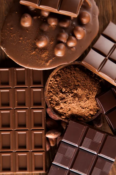 Assorted Chocolate Bars and Cocoa Powder