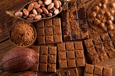 Assorted Chocolate Bars And Raw Cacao Beans