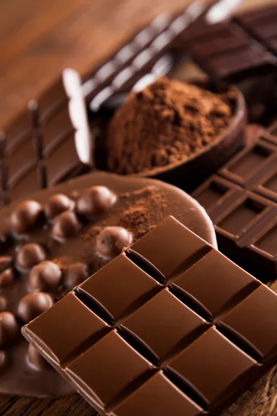 Assorted Chocolate Bars and Cocoa Powder