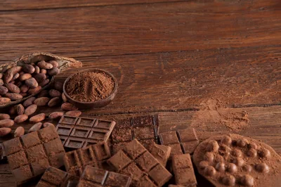 Assorted Chocolate Bars And Raw Cacao Beans