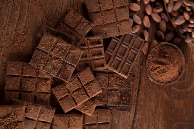 Dark Chocolate Bars With Cocoa Powder And Beans