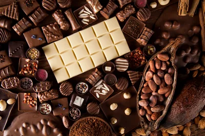 Assorted Gourmet Chocolates and Raw Cacao Beans