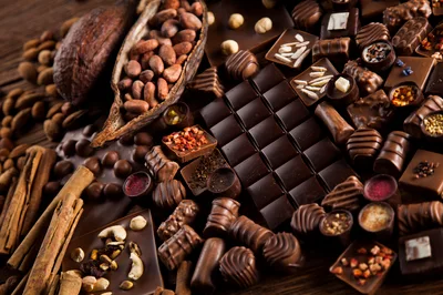 Assorted Gourmet Chocolates and Cocoa Beans