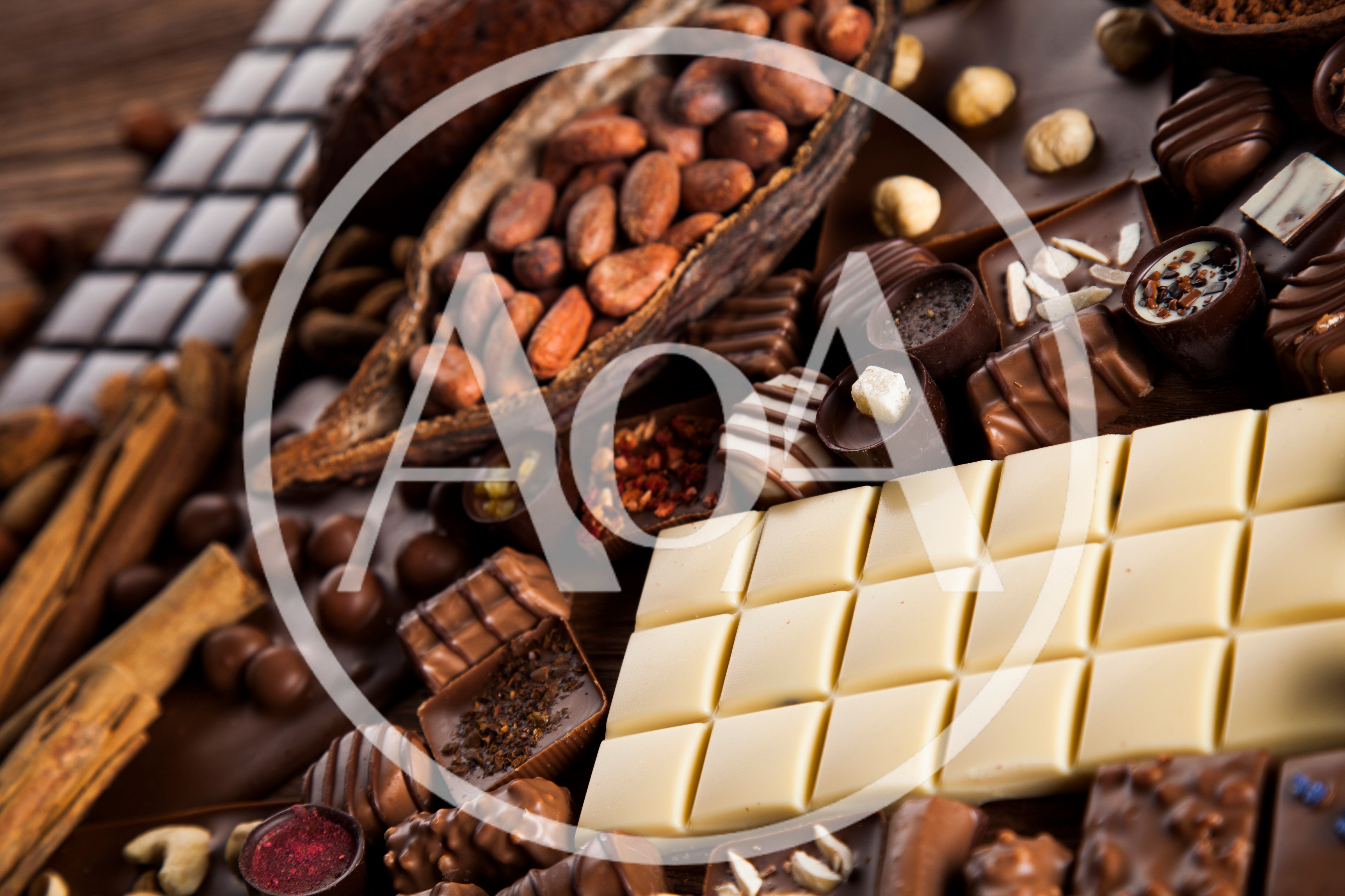 Assorted Gourmet Chocolates and Cocoa Beans