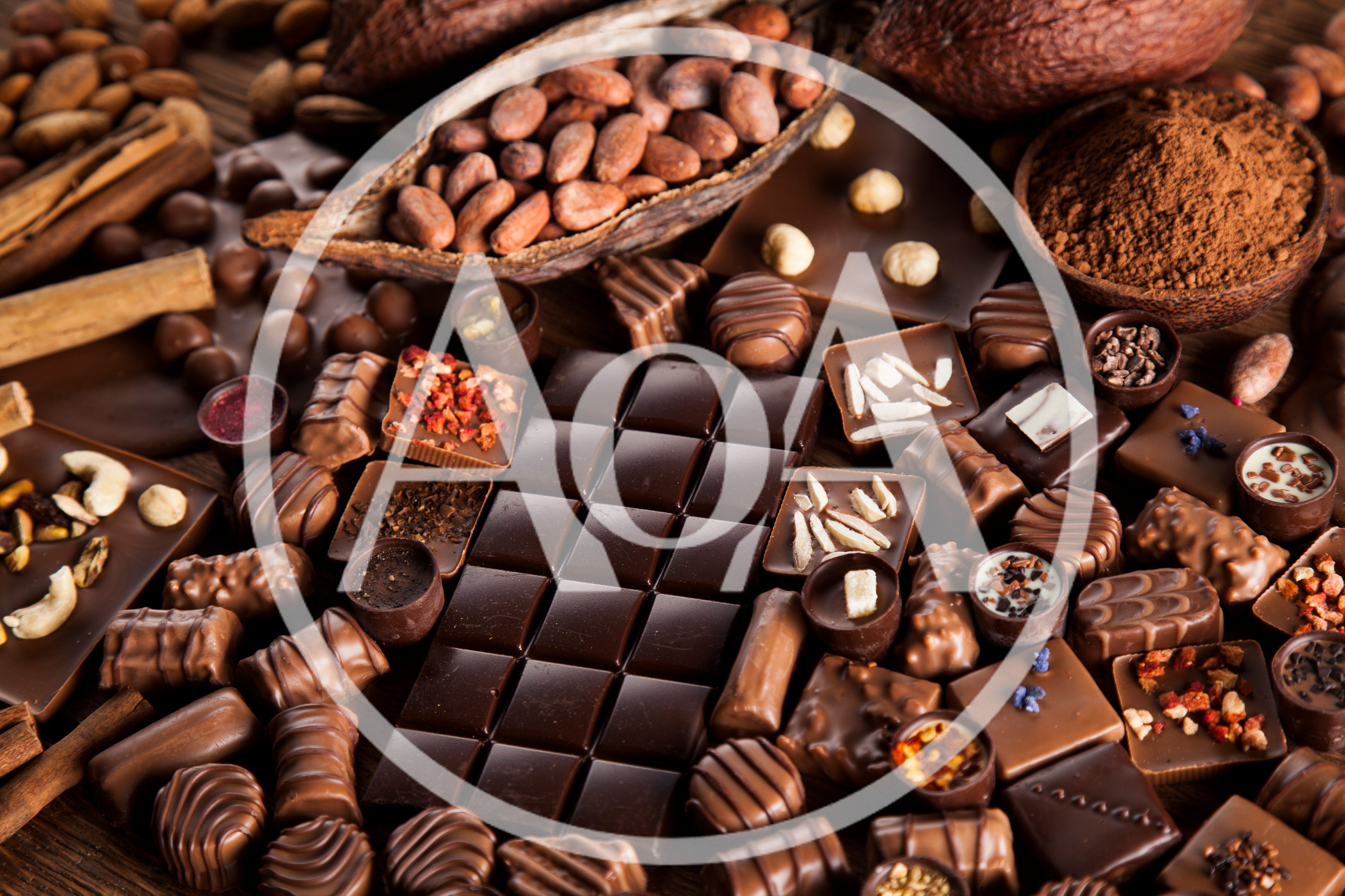 Assorted Gourmet Chocolates and Cocoa Beans