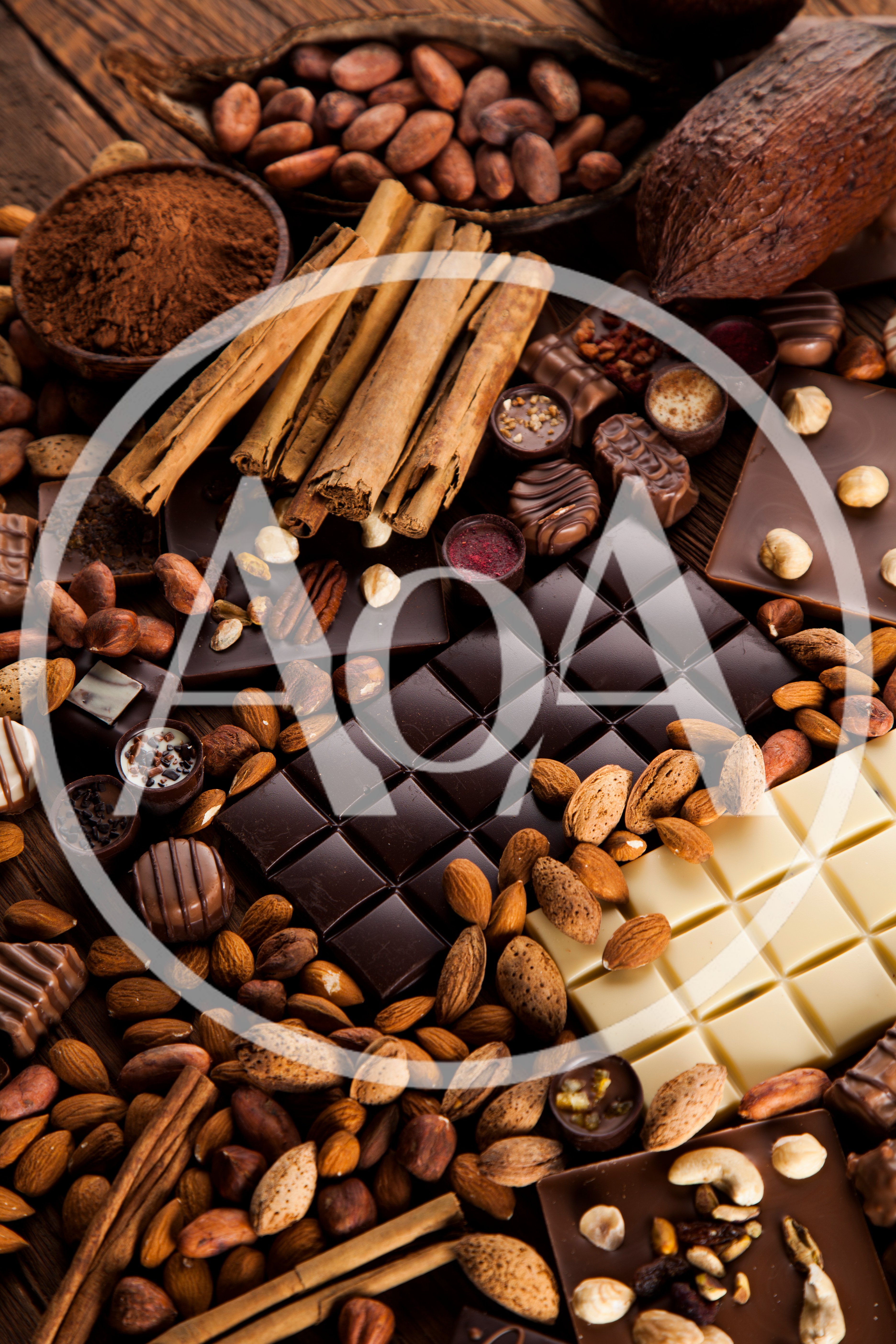 Assorted Chocolate Bars With Nuts And Cinnamon Sticks
