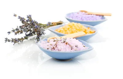 Three Bowls Of Bath Salts With Lavender Sprigs