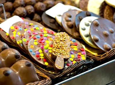 Assorted Gourmet Chocolates Displayed In A Market