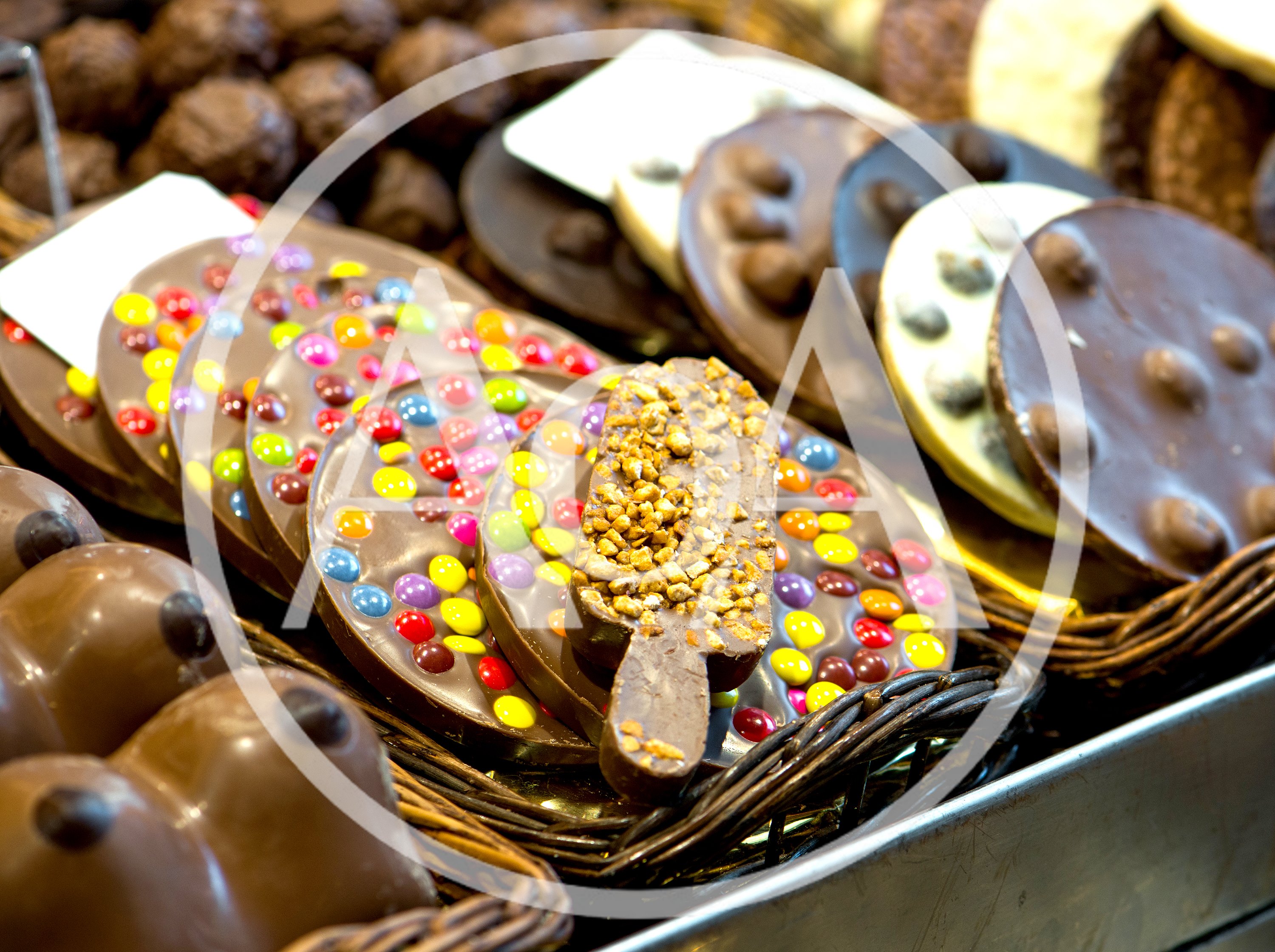 Assorted Gourmet Chocolates Displayed In A Market