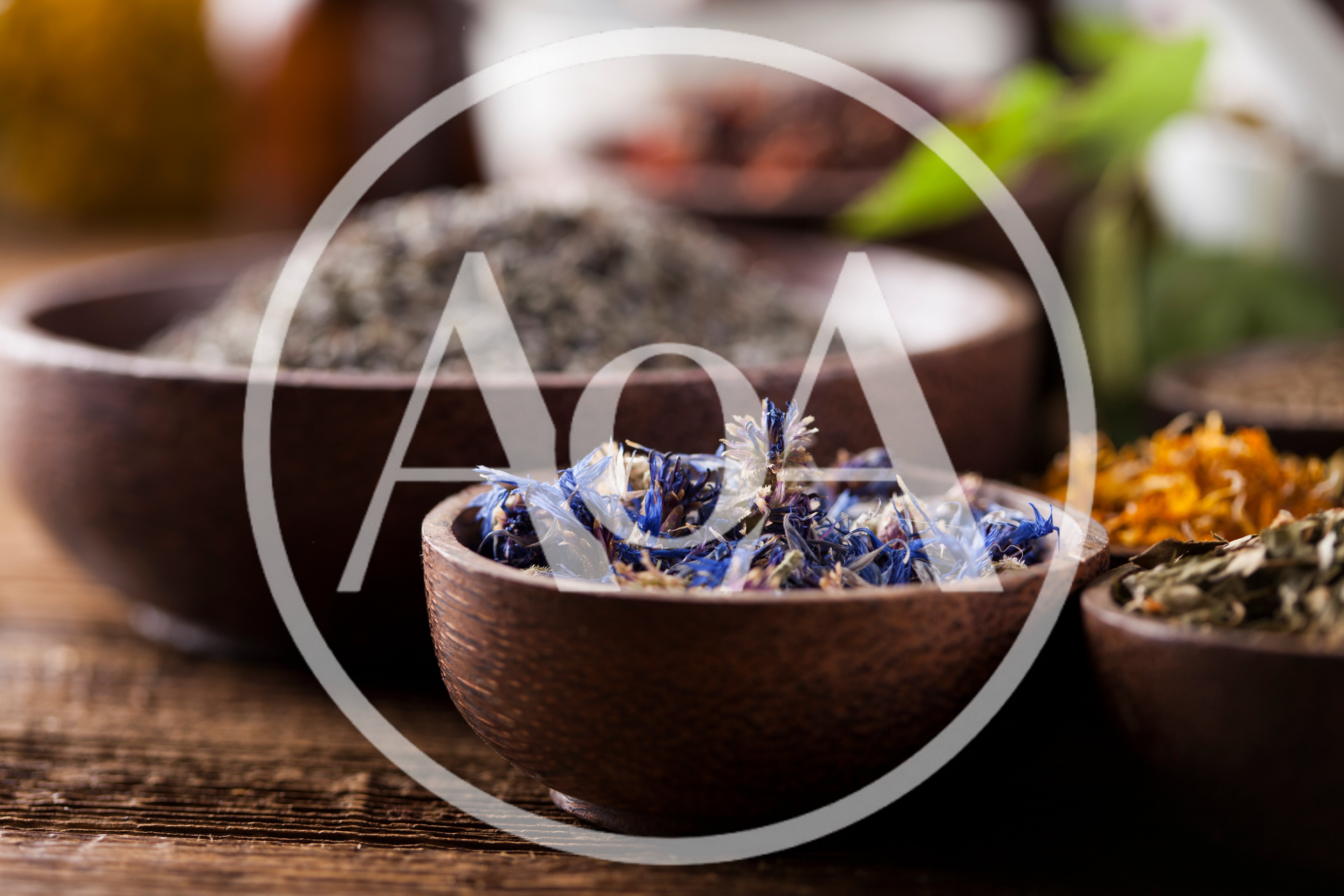 Dried Cornflower Petals In A Small Wooden Bowl