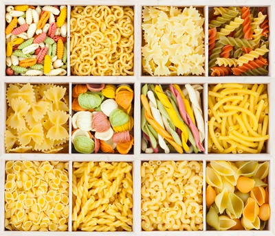 Assorted Varieties Of Dry Pasta In A Grid Box
