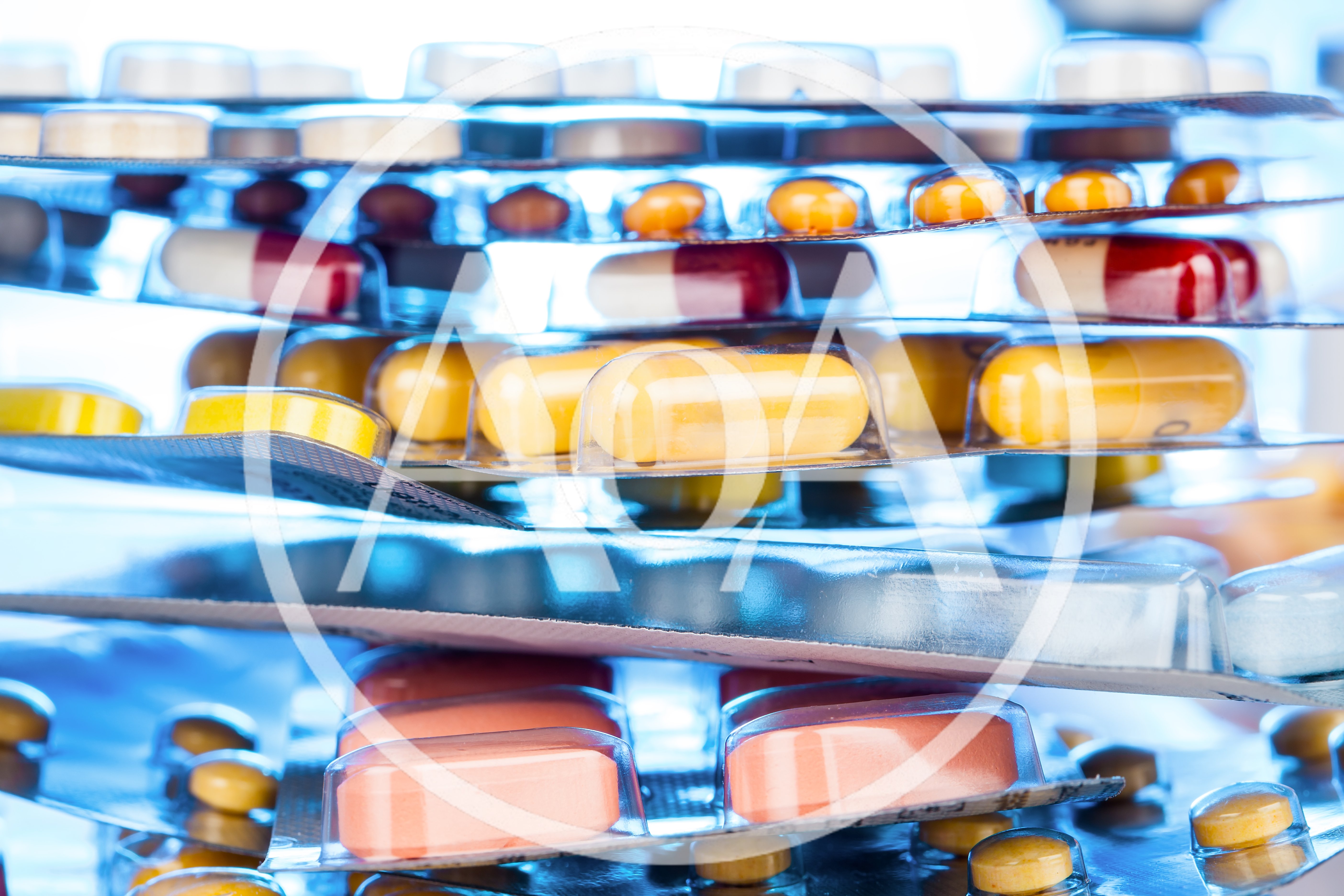 Stack of Pharmaceutical Blister Packs with Various Pills