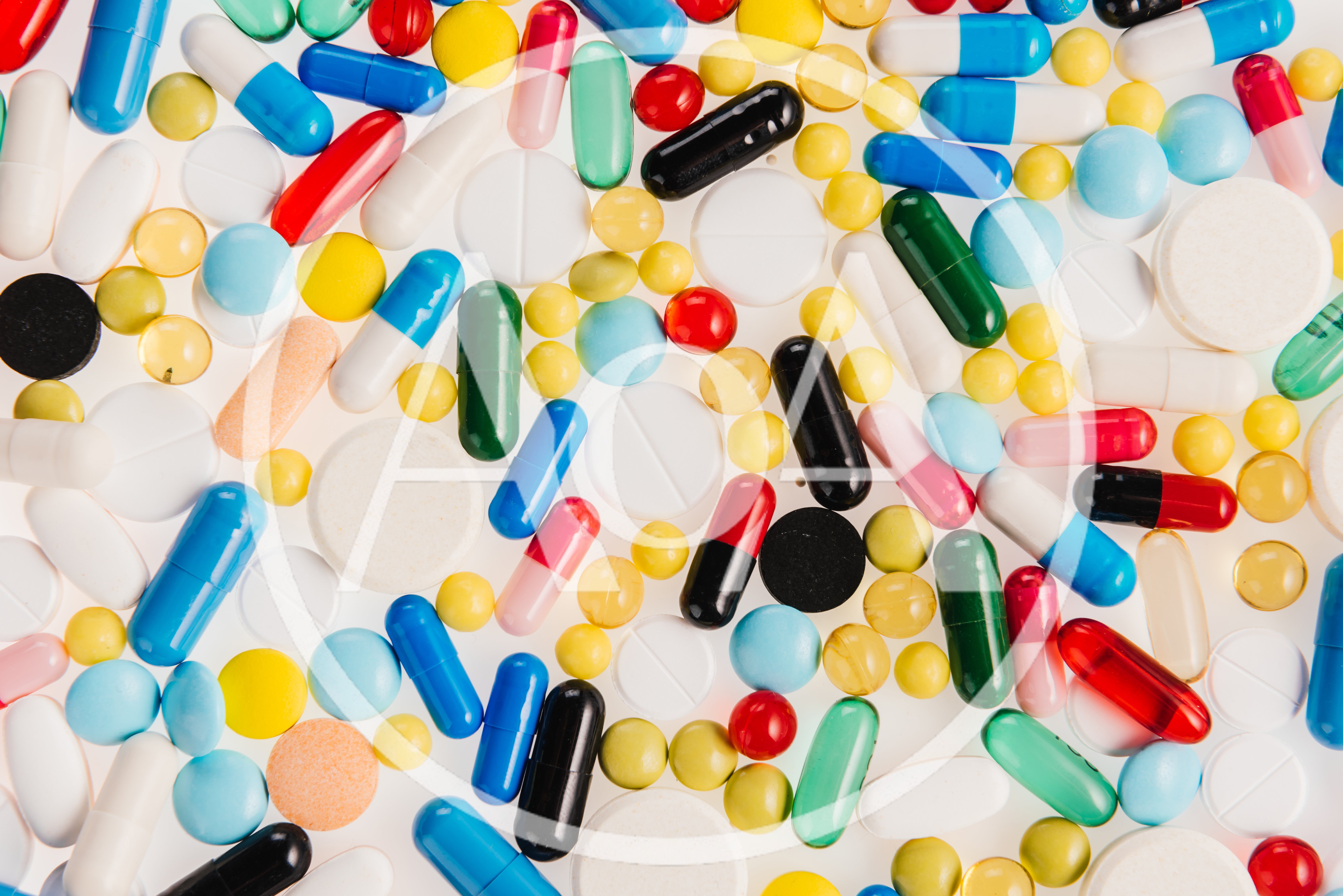 Assorted Pharmaceutical Pills and Capsules Background