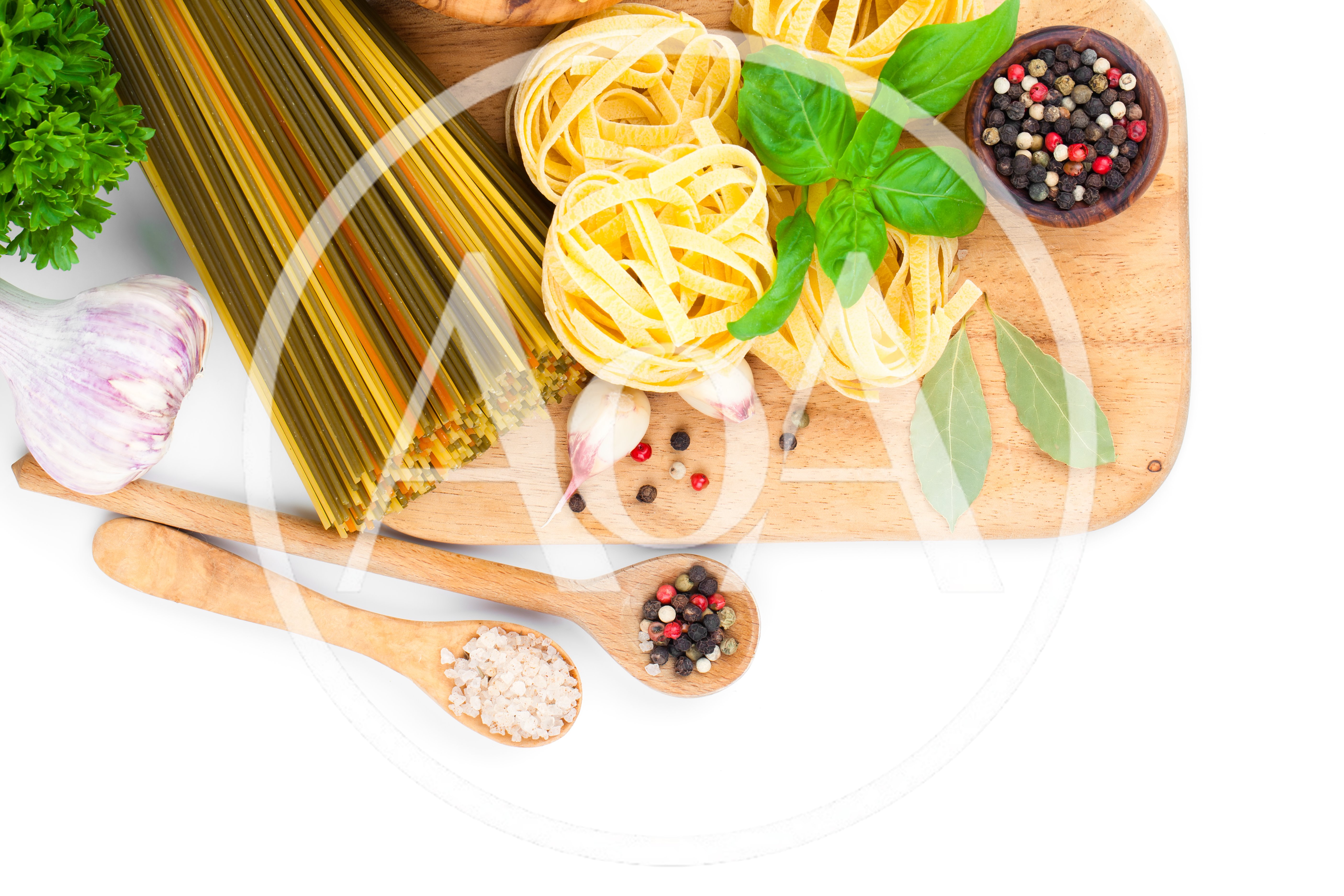 Assorted Pasta Ingredients On A Wooden Cutting Board
