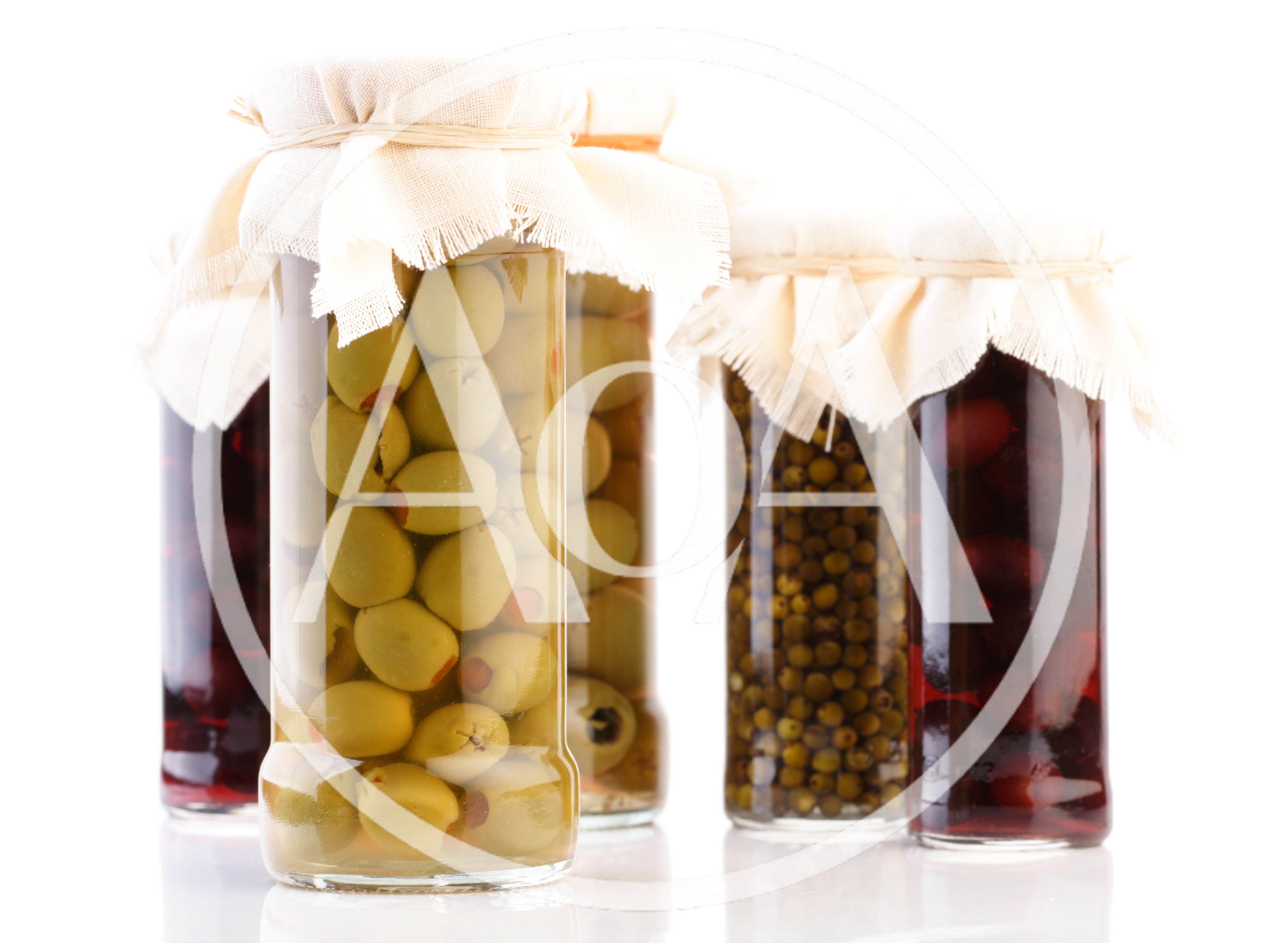 Glass Jars Filled With Pickled Olives And Capers