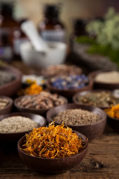 Dried Calendula Petals in Wooden Bowl