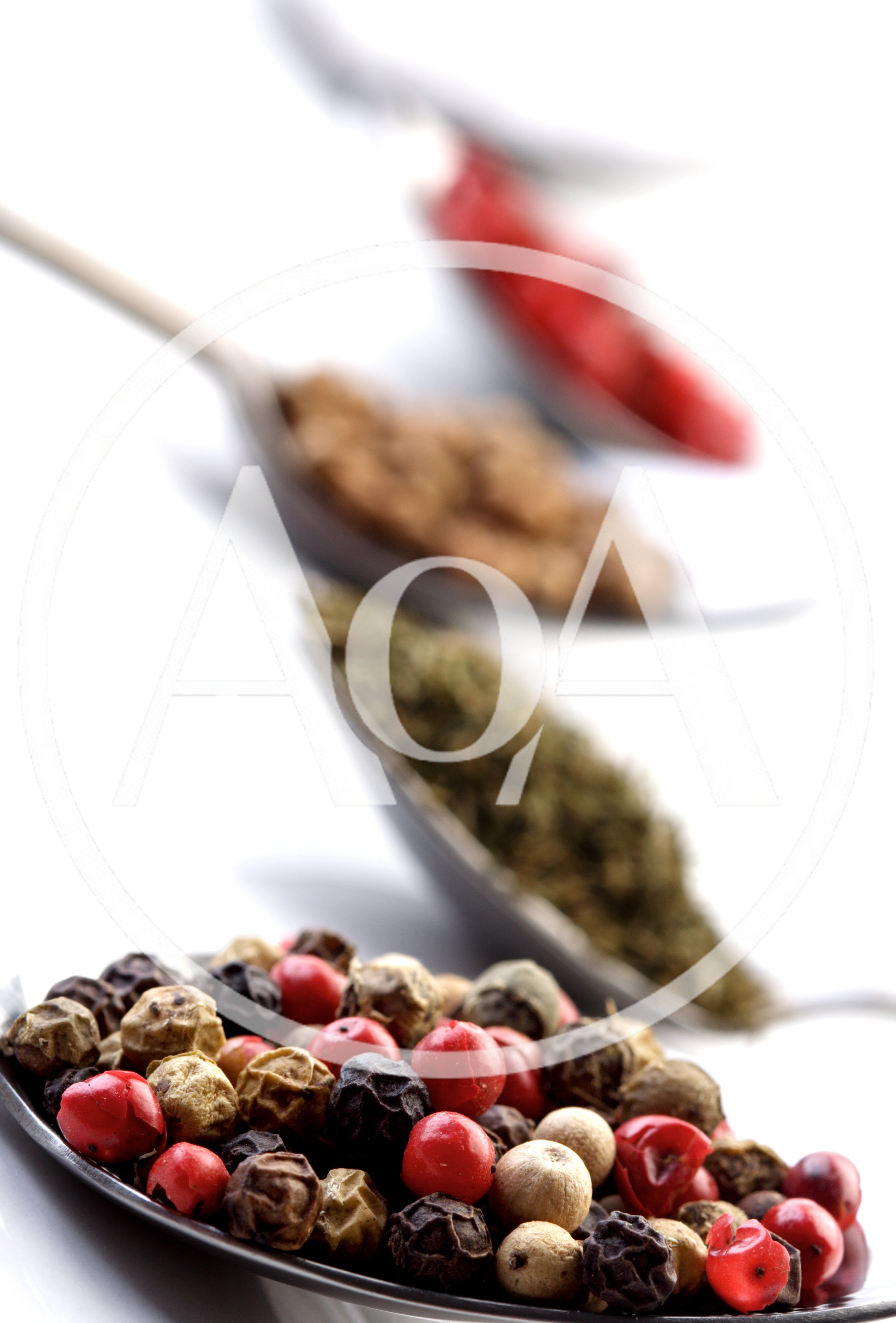 Four Spoons Filled With Various Colorful Spices