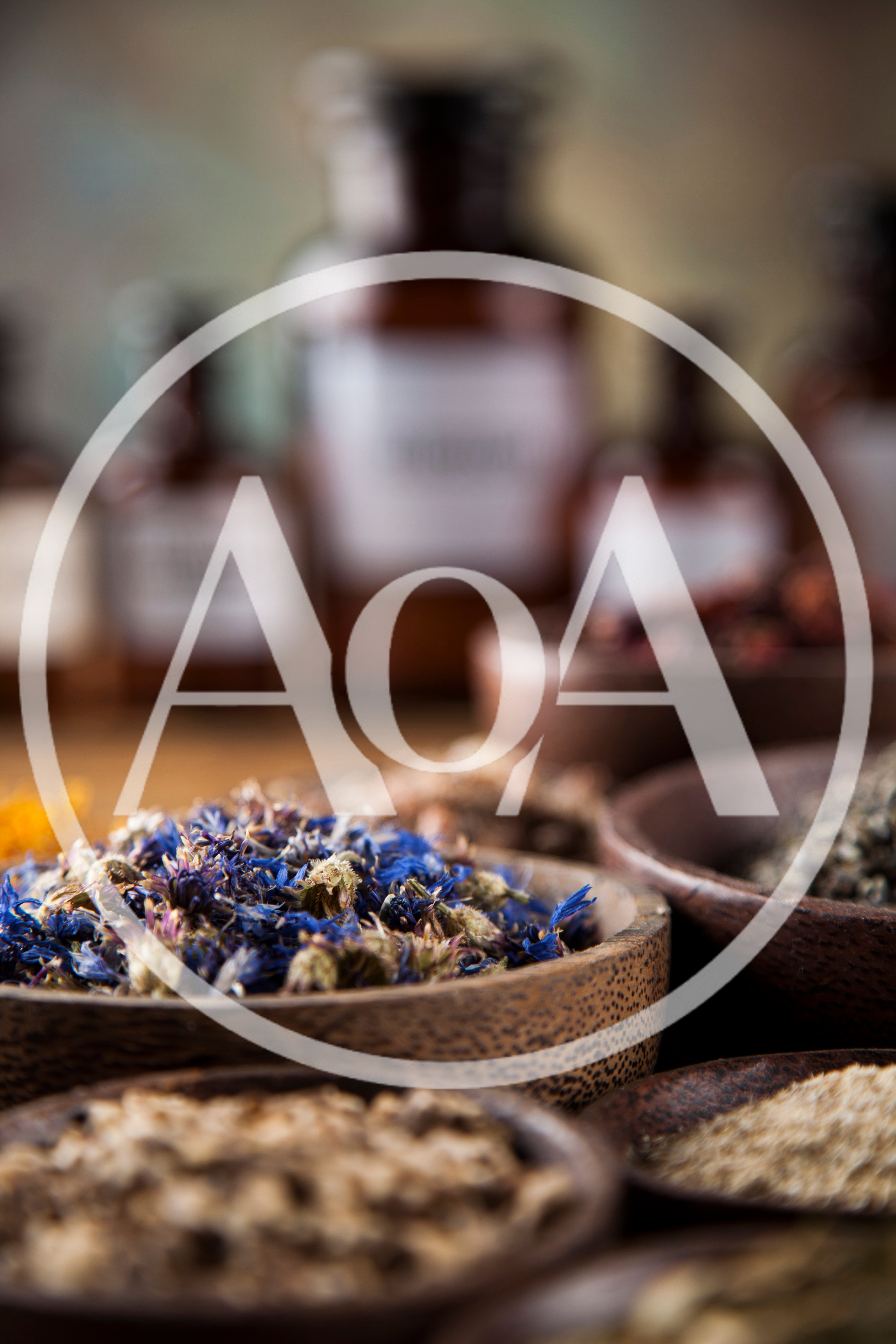 Assorted Dried Medicinal Herbs In Wooden Bowls
