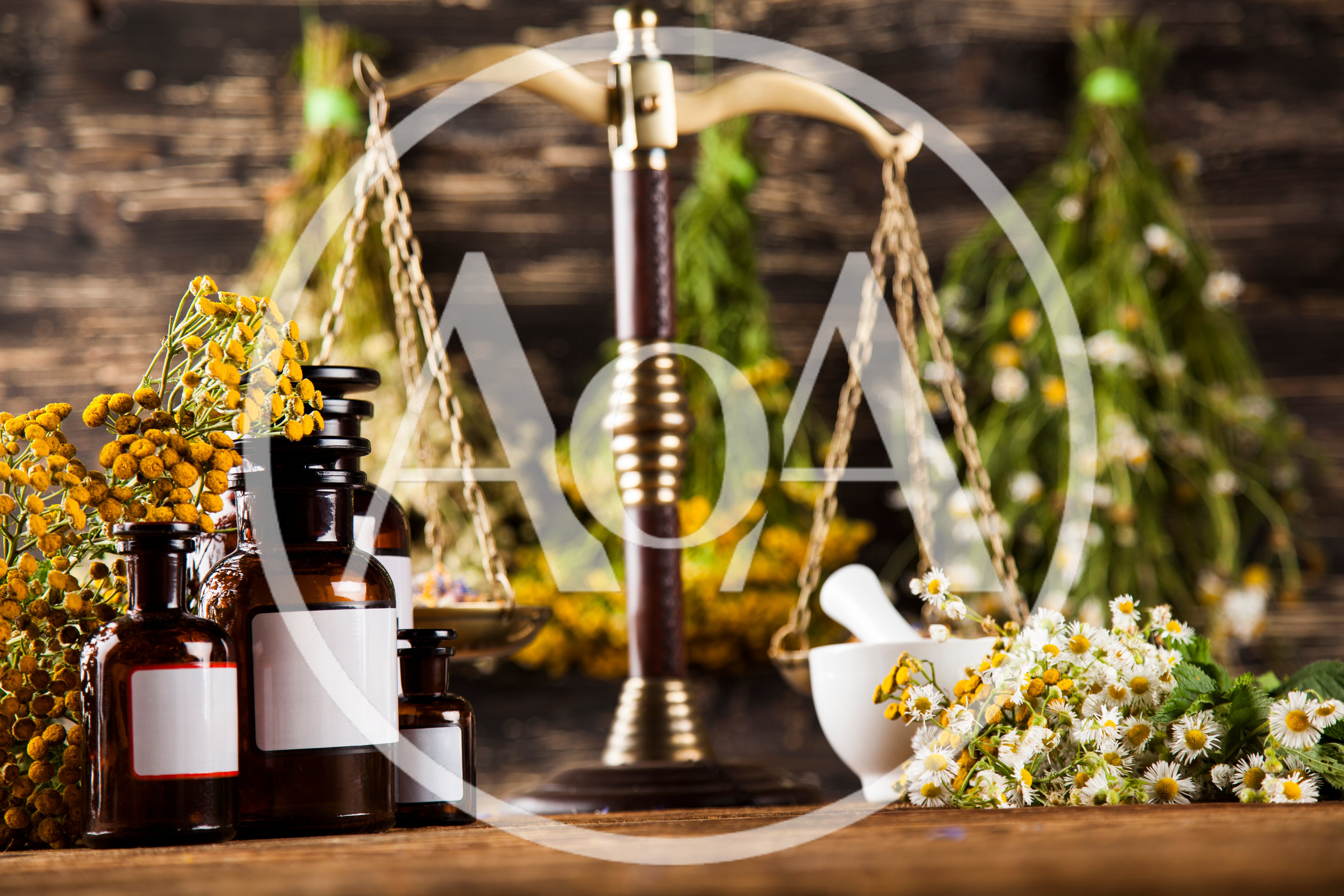 Herbal Medicine Bottles And Scales On Wooden Table