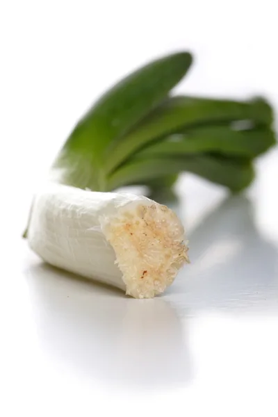 Fresh Green Onion Stalk On White Background