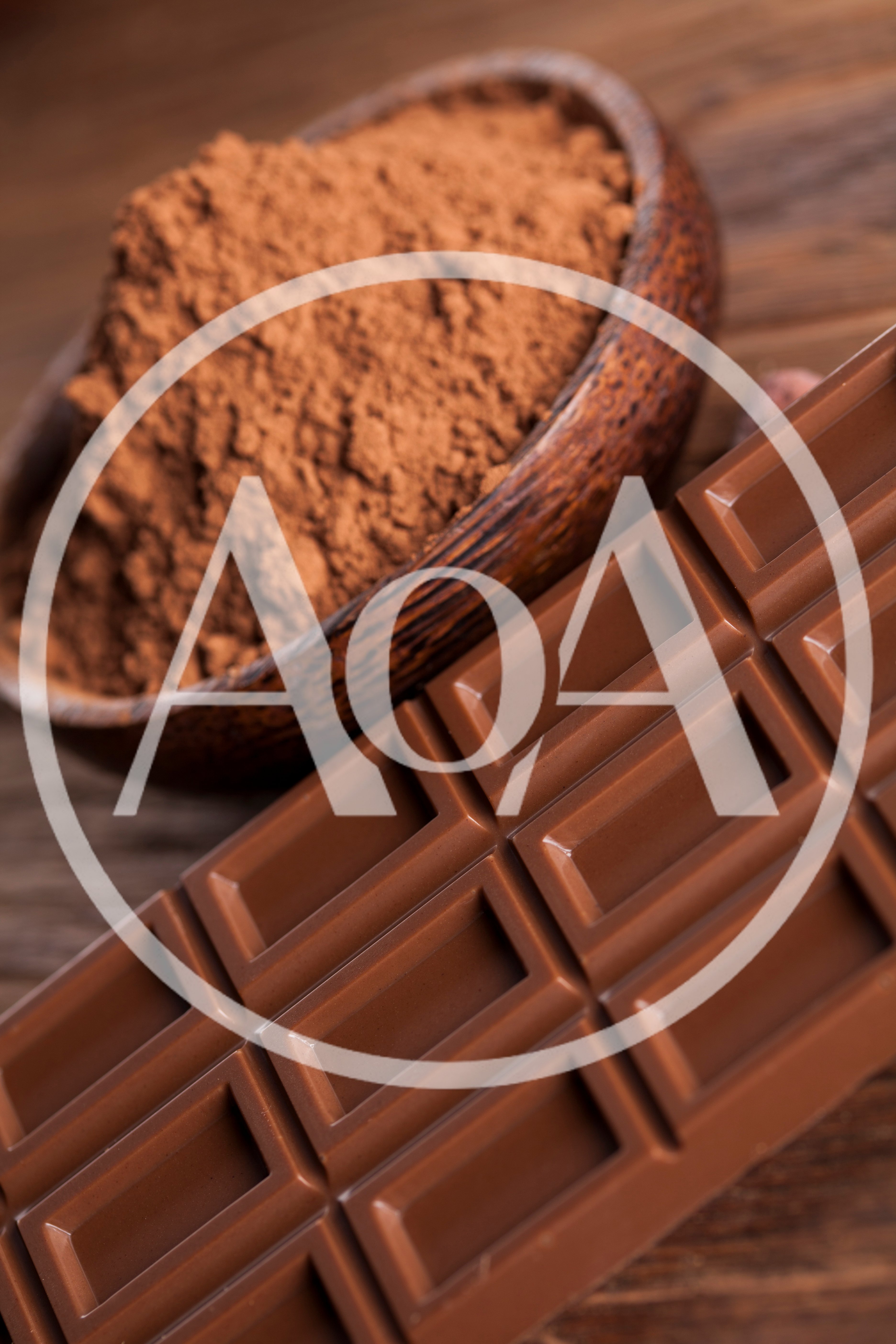 Milk Chocolate Bar And Cocoa Powder In Wooden Bowl