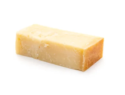 Block Of Aged Parmesan Cheese On White Background
