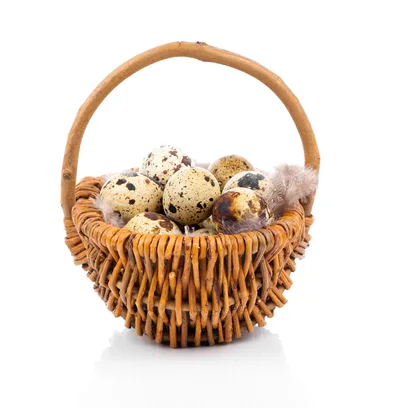 Quail Eggs In A Small Woven Basket
