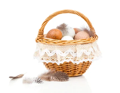 Wicker Basket Filled With Speckled Easter Eggs