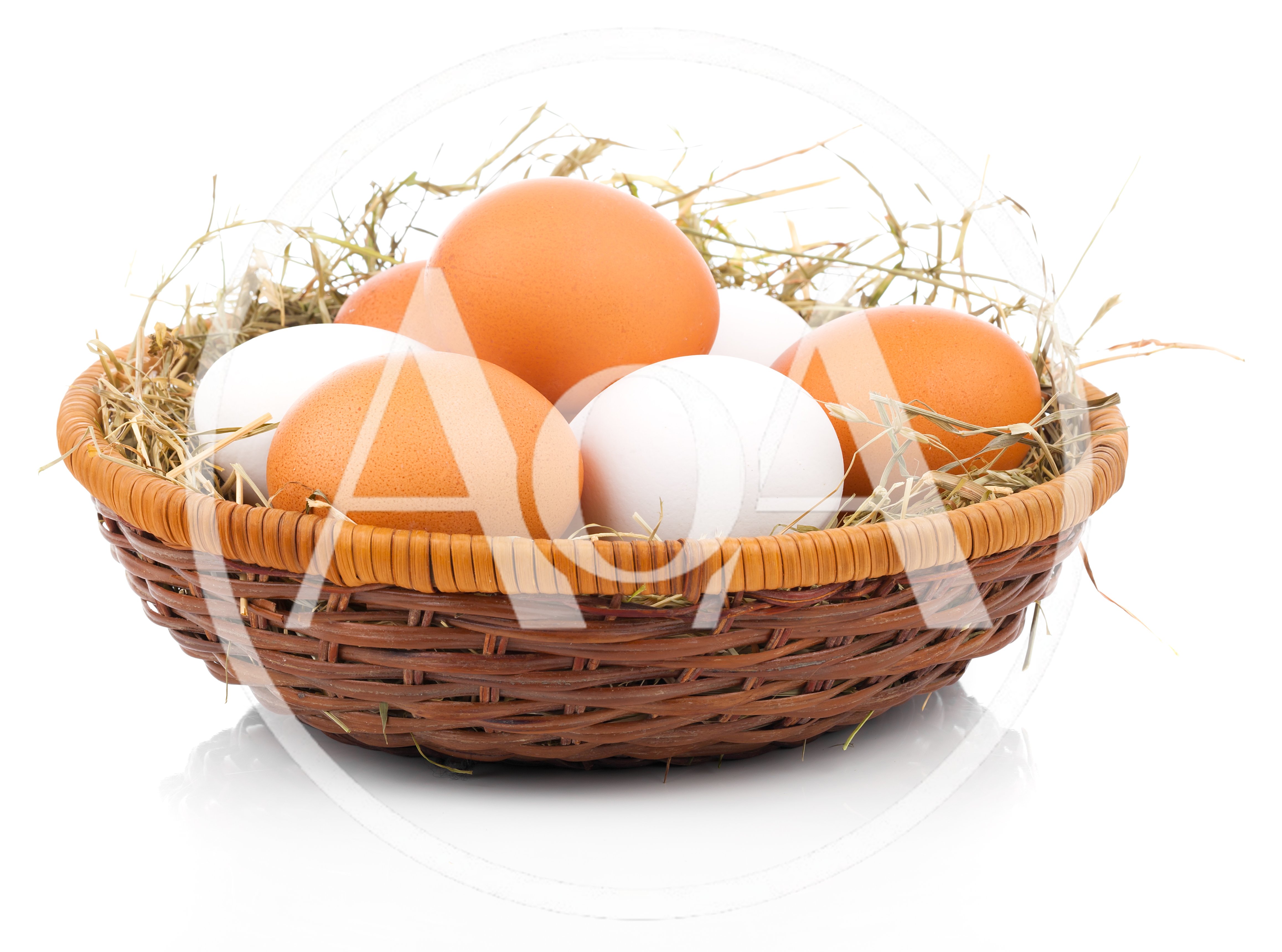 Fresh Brown and White Eggs in Wicker Basket