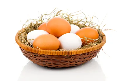 Fresh Chicken Eggs In A Woven Basket