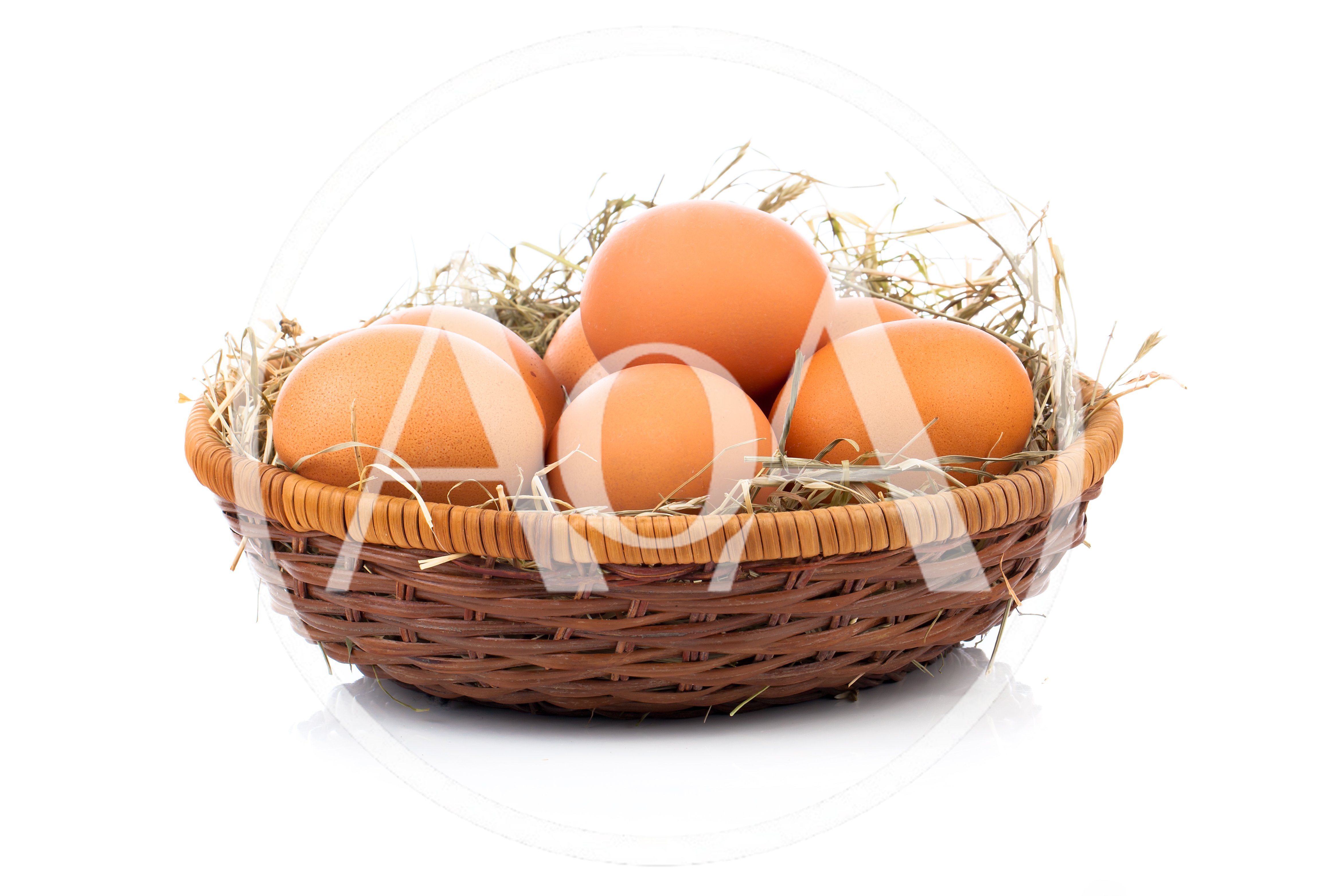 Fresh Brown Chicken Eggs In A Woven Basket