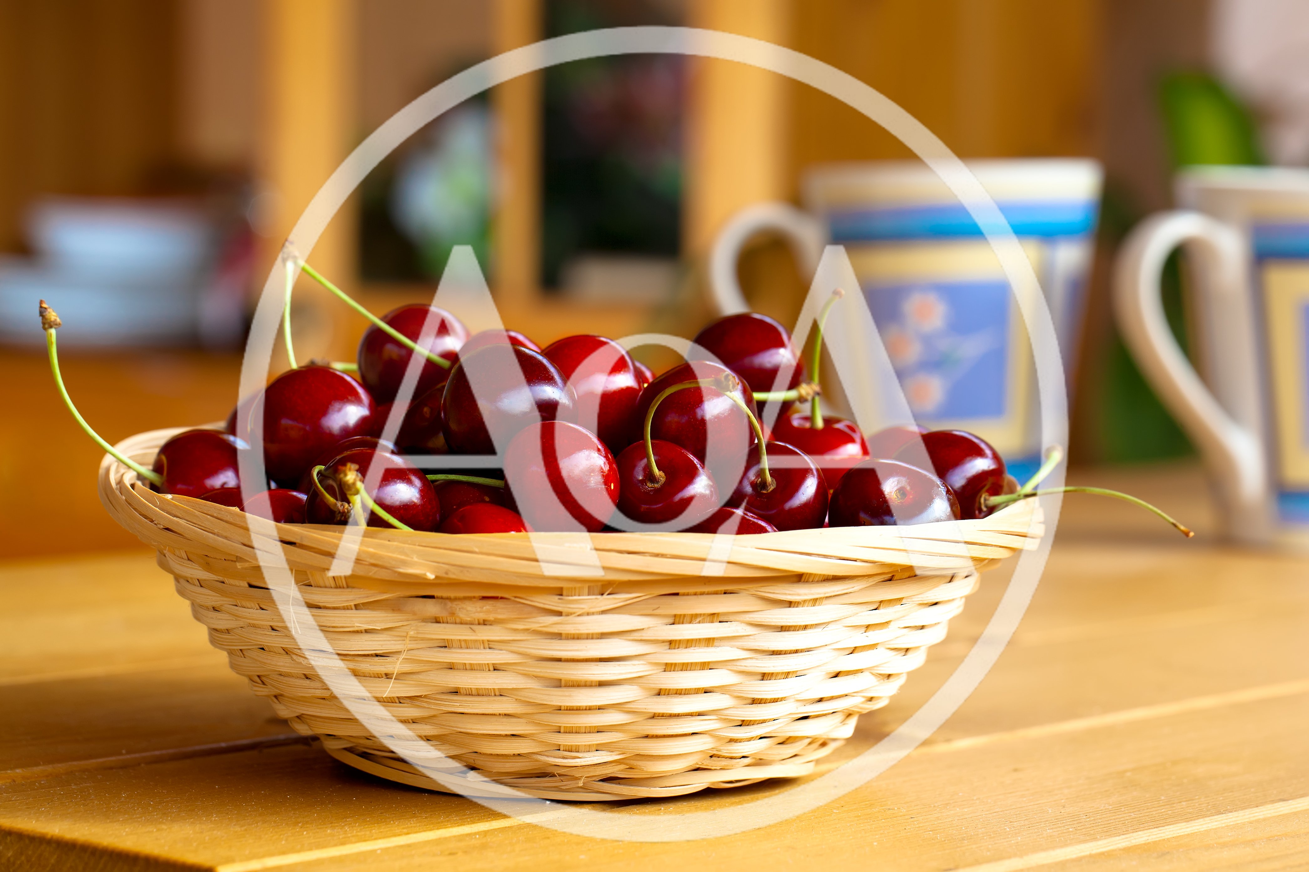 Fresh Red Cherries In A Wicker Basket