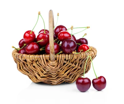 Fresh Red Cherries In A Woven Basket