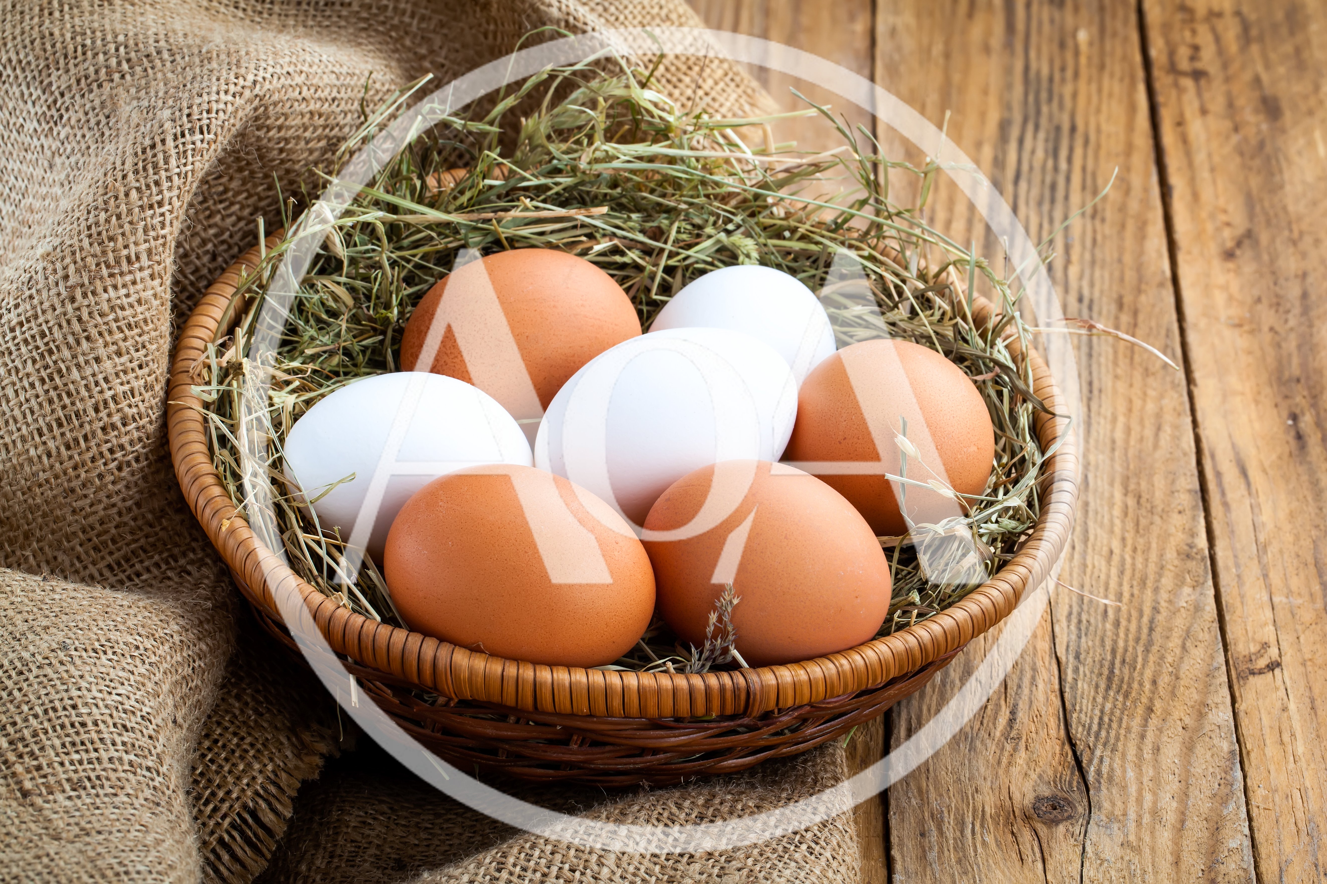 Fresh Chicken Eggs In A Woven Basket