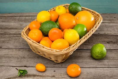 Assorted Citrus Fruits In A Wicker Basket